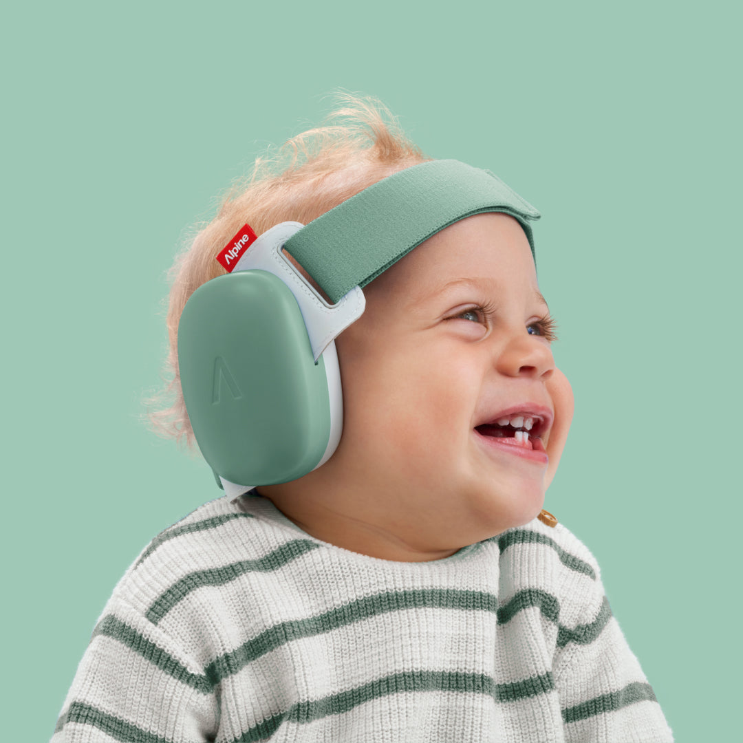 Baby wearing muffy baby in sage-green