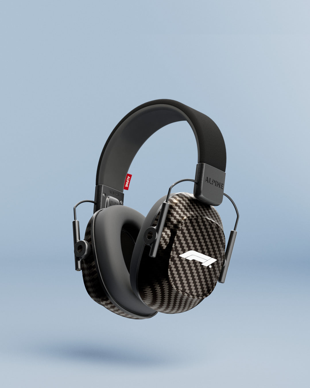 Alpine Formula 1® Earmuffs seen from the side, carbon-look ear cups and black padded headband, 3D render