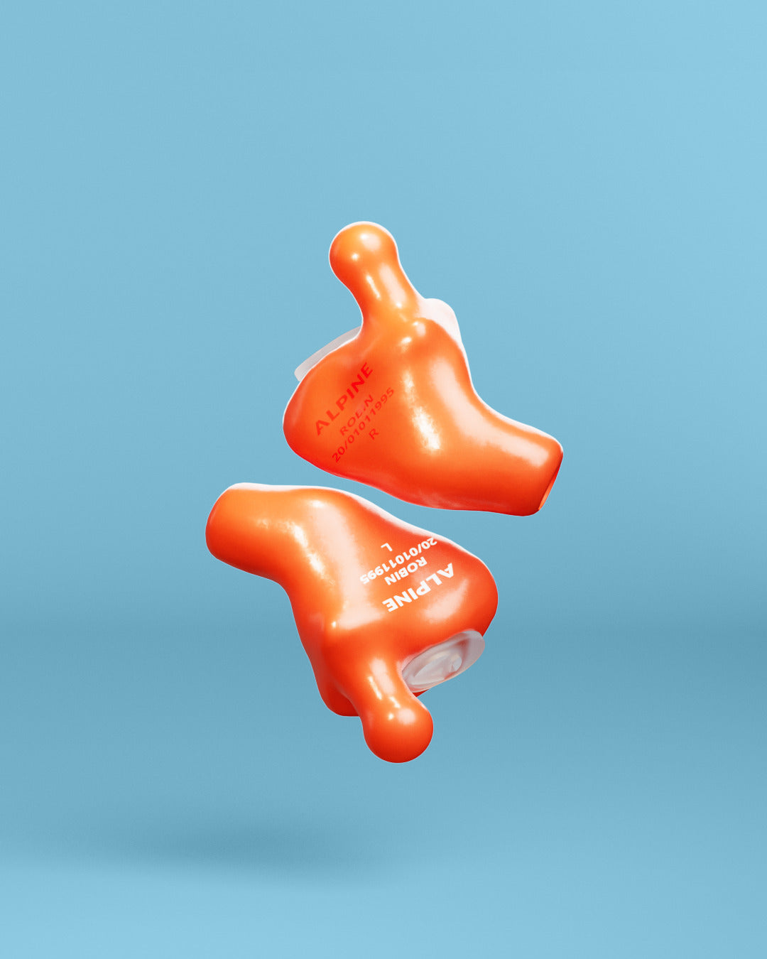 Pair of Alpine MusicSafe Custom Orange earplugs with filters, 3D render 