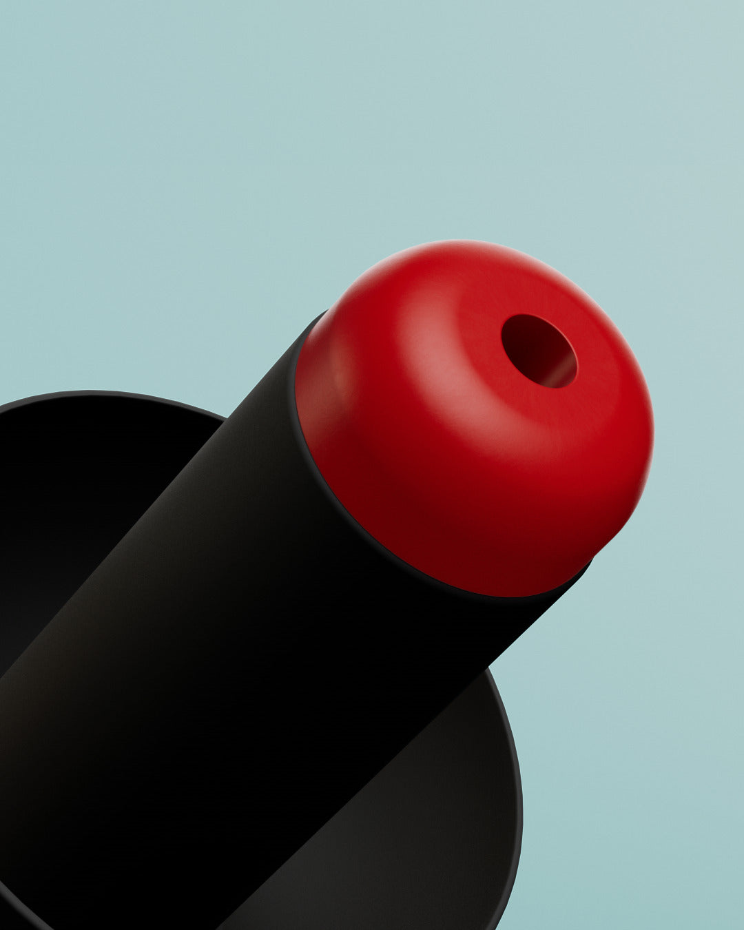 Alpine WorkSafe close-up of the red filter tip with central opening on a black earplug 